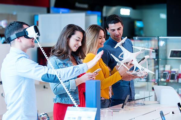 young adults playing with drones 